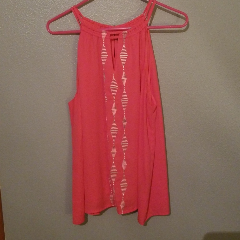 Sleeveless strappy blouselooks orangey in pic, but